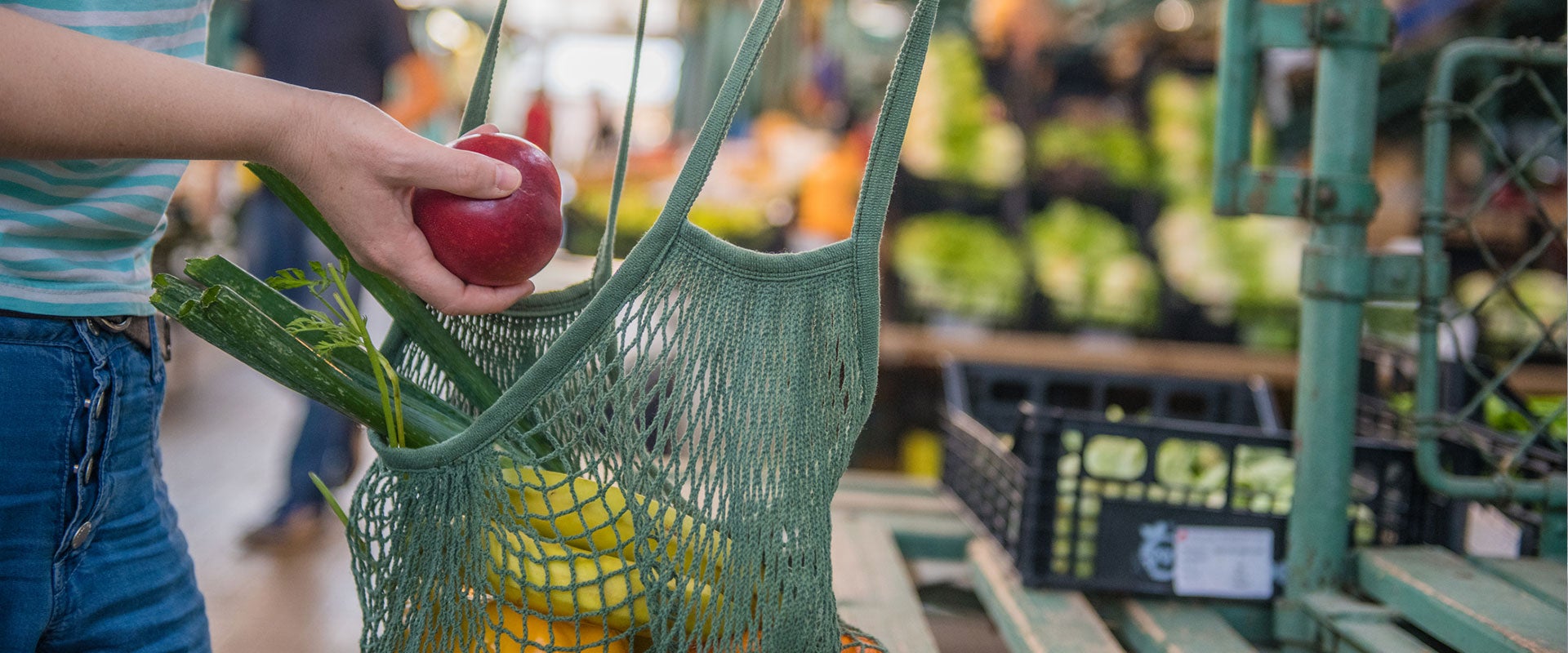 grocery shopping with reusable bag