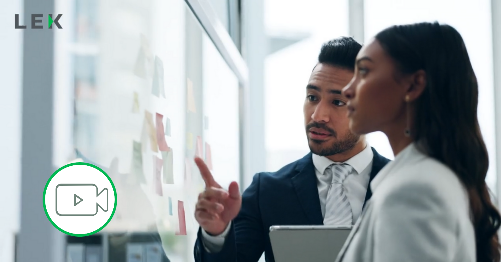 two colleagues discussing data